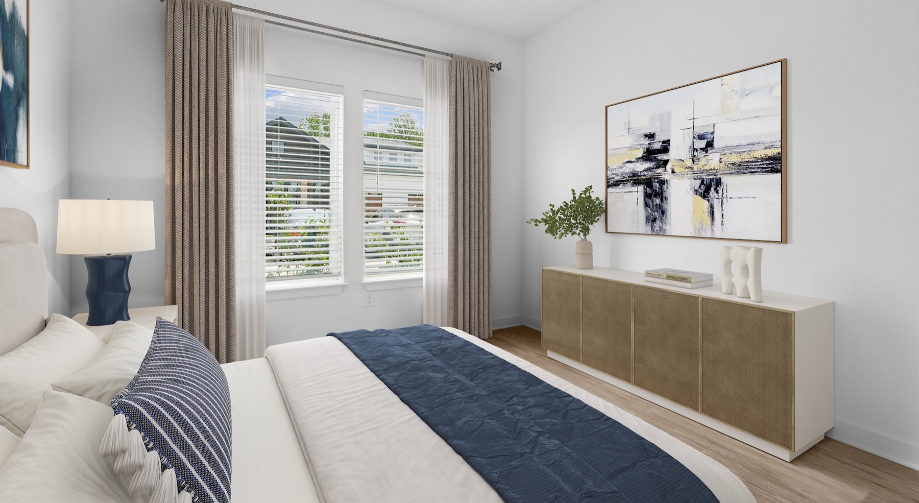 a bedroom with a bed and a dresser