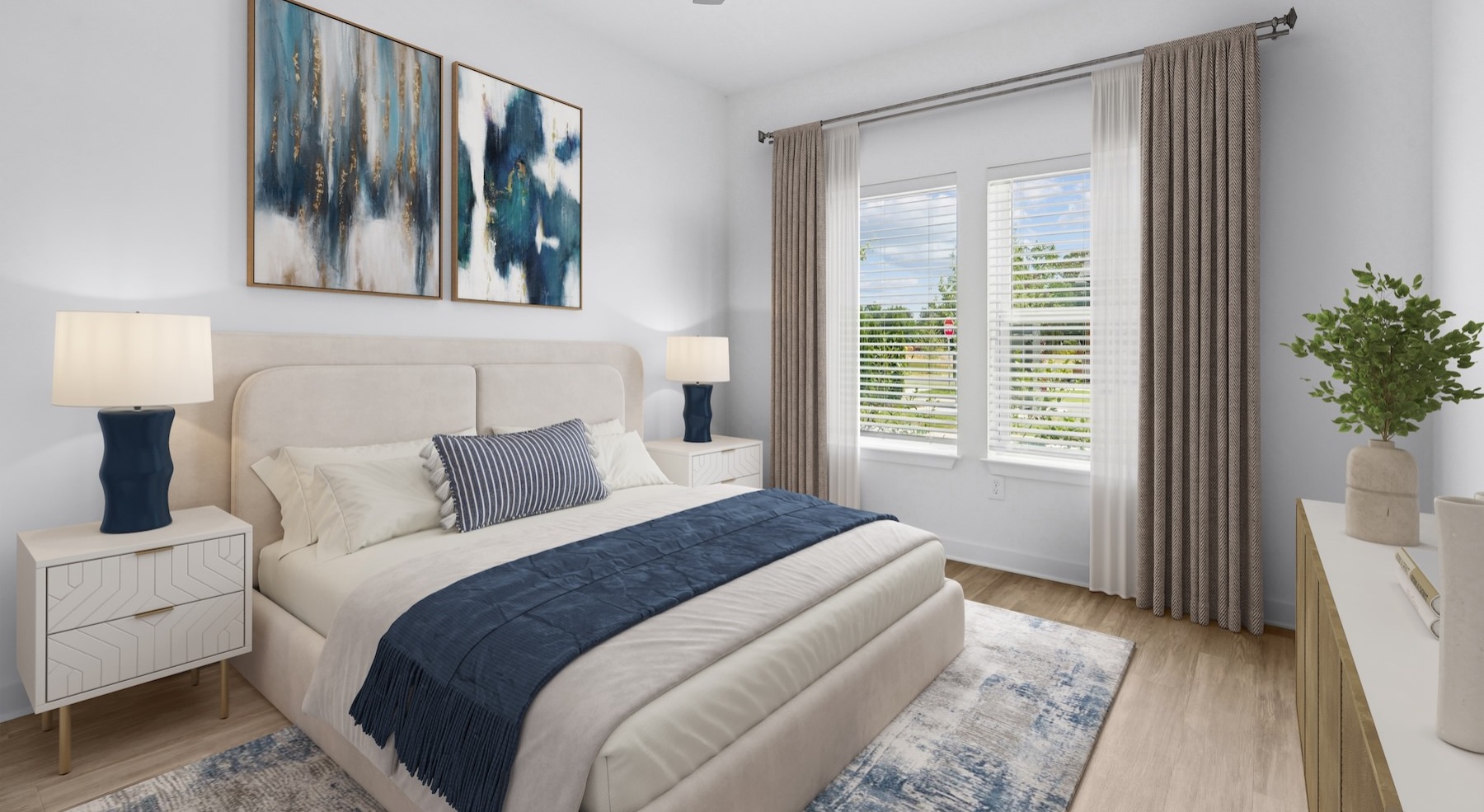 a bedroom with a bed and two nightstands