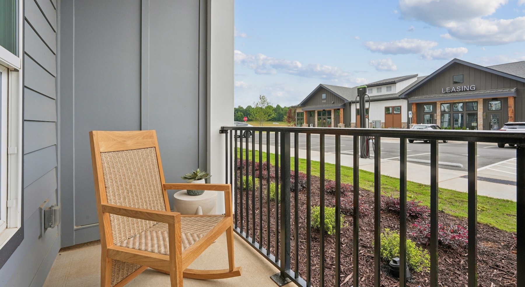 a patio with a rocking chair